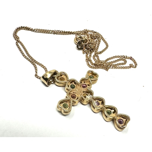 143 - 9ct gold gemstone set  cross necklace weight approx 4.3g