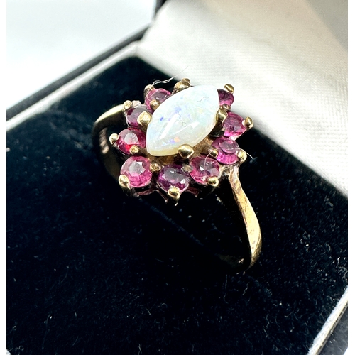 146 - 9ct gold opal & ruby ring weight 2.5g