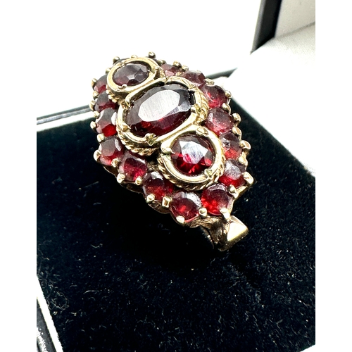 158 - 9ct gold garnet ring weight 5.8g