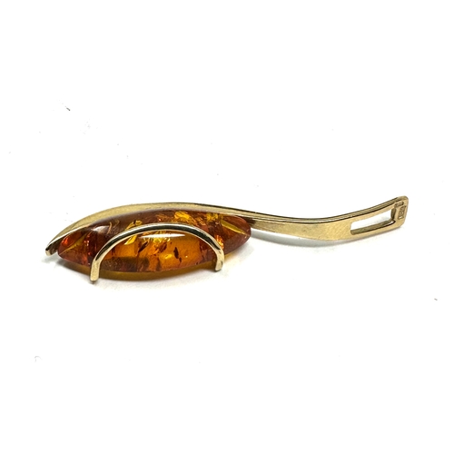 168 - 14ct gold amber pendant measures approx 4.2cm drop weight 2g