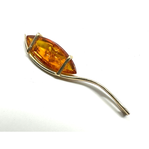 168 - 14ct gold amber pendant measures approx 4.2cm drop weight 2g