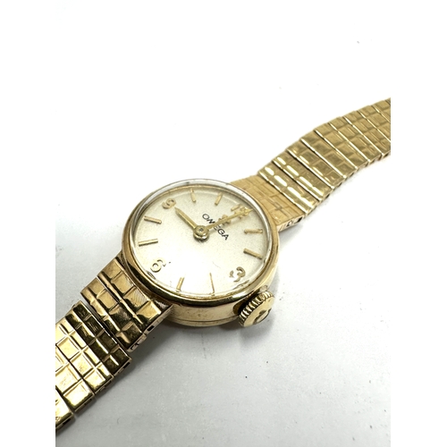 378 - 9ct gold omega wristwatch weight approx 20g the watch is ticking