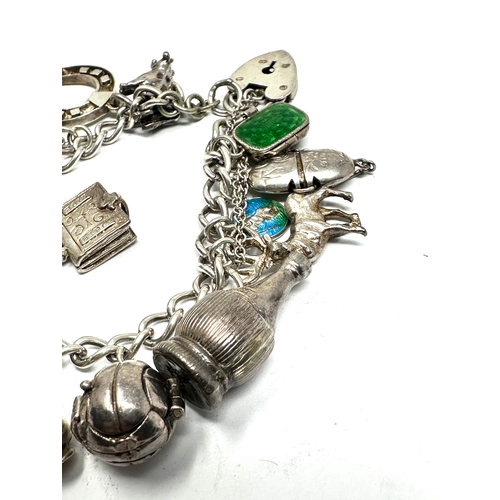 283 - Vintage silver charm bracelet weight 50g