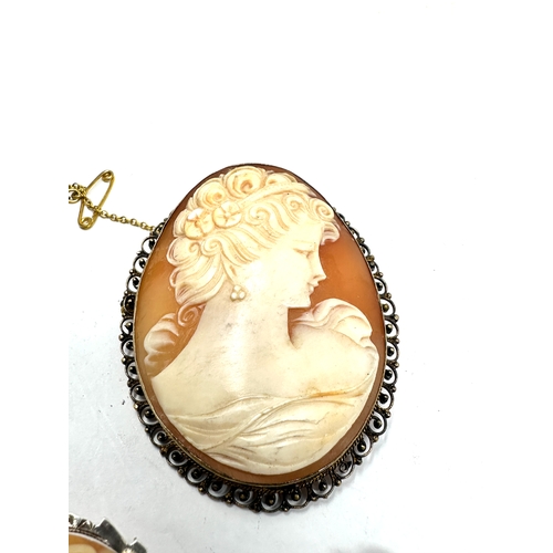 287 - 3 Vinatge silver framed cameo brooches largest measures approx 5.6cm by 4.5cm weight 33g