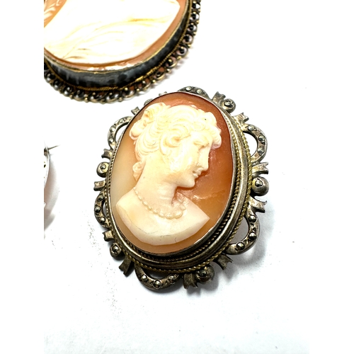 287 - 3 Vinatge silver framed cameo brooches largest measures approx 5.6cm by 4.5cm weight 33g