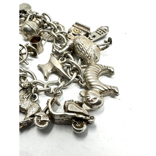 290 - Vintage silver charm bracelet weight 81g