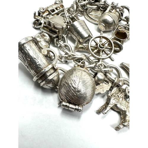 290 - Vintage silver charm bracelet weight 81g