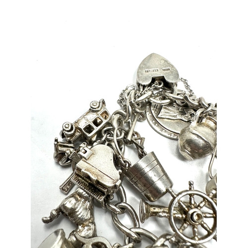 290 - Vintage silver charm bracelet weight 81g