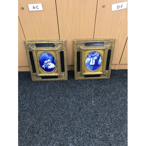 440 - Pair of framed blue and white tiles, measures approximately 17 inches by 15 inches