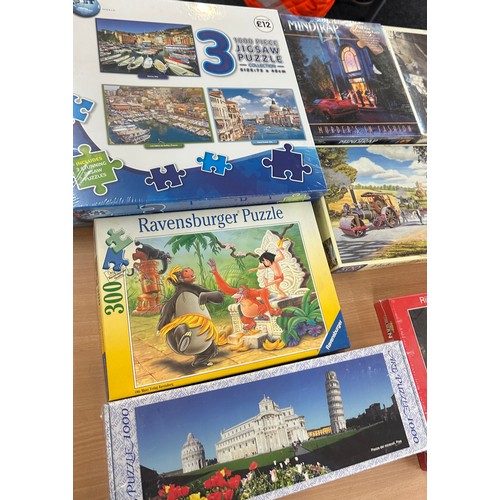 372 - Selection of approximately 20 jigsaws, some factory sealed