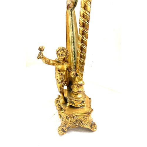 75 - Gilt harp shaped cherub table mirror, overall height 24 inches