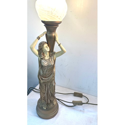 85 - Pair gold lady with flame shaped table lamps, working order, overall height 28 inches