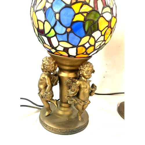 96 - Cherub base lamps, with sphere glass shades, working order, overall height 17 inches