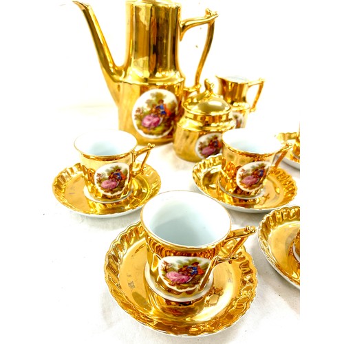 13 - Gold Limoges coffee set comprising 6 cups, saucer, coffee pot, milk and sugar