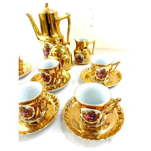 13 - Gold Limoges coffee set comprising 6 cups, saucer, coffee pot, milk and sugar