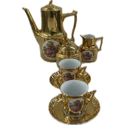 13 - Gold Limoges coffee set comprising 6 cups, saucer, coffee pot, milk and sugar