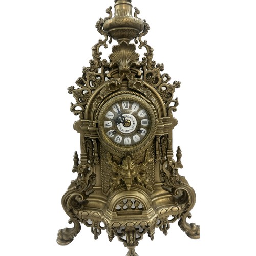 74 - Ornate French brass mantel clock with enamel face, with key, depicting cherubs, Height 24 inches, Wi... 