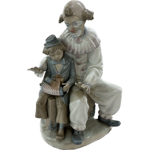 522 - Nao figure depicting Clown and boy, approximate height: 11 inches