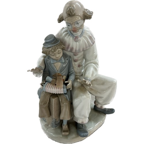 522 - Nao figure depicting Clown and boy, approximate height: 11 inches