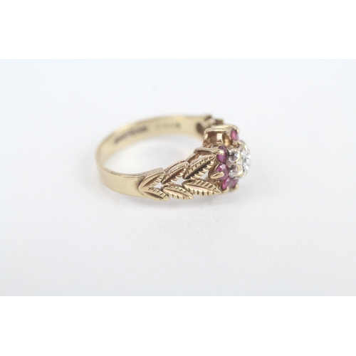 243 - 9ct gold vintage ruby & diamond cluster ring with foliate patterned shoulders (as seen)