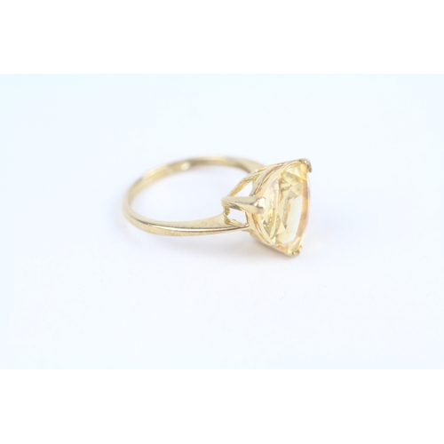 244 - 9ct gold trillion cut citrine dress ring