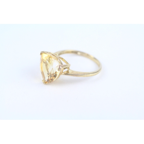 244 - 9ct gold trillion cut citrine dress ring