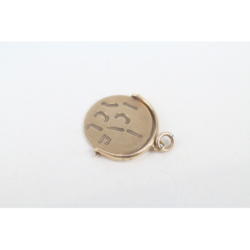 251 - 9ct gold vintage 'I love you' spinner charm