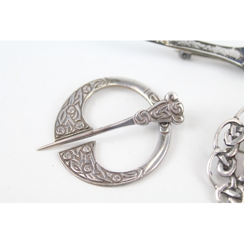 323 - Four Scottish silver brooches including a penannular (46g)