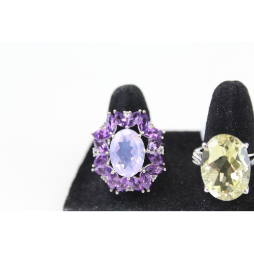 325 - Eight silver stone set rings including amethyst and topaz (39g)