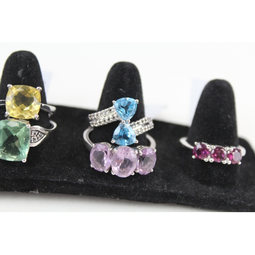 325 - Eight silver stone set rings including amethyst and topaz (39g)