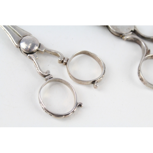 82 - 2 x .925 sterling sugar nips / tongs