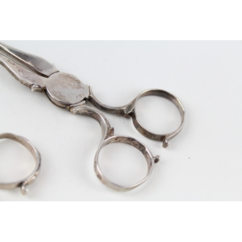 82 - 2 x .925 sterling sugar nips / tongs