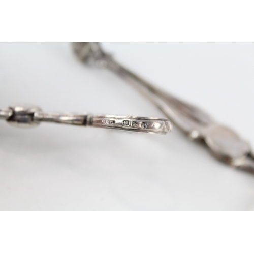 82 - 2 x .925 sterling sugar nips / tongs