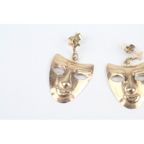 218 - 9ct gold greek thearture mask drop earrings with scroll backs