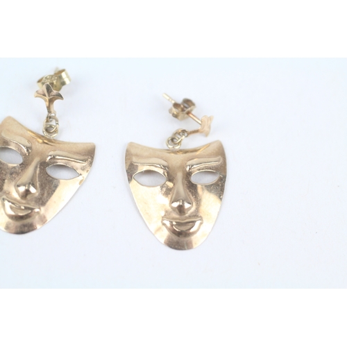 218 - 9ct gold greek thearture mask drop earrings with scroll backs