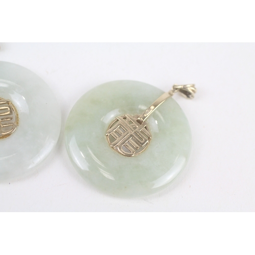 221 - 2 x 9ct gold jade pendants