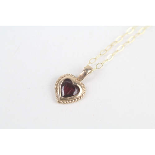 226 - 9ct gold heart shaped garnet pendant necklace