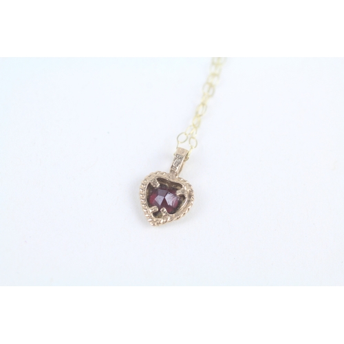 226 - 9ct gold heart shaped garnet pendant necklace