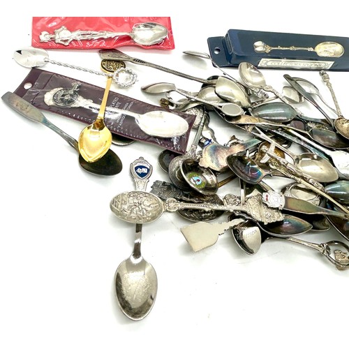 514 - Assortment of silver plated souvenir spoons