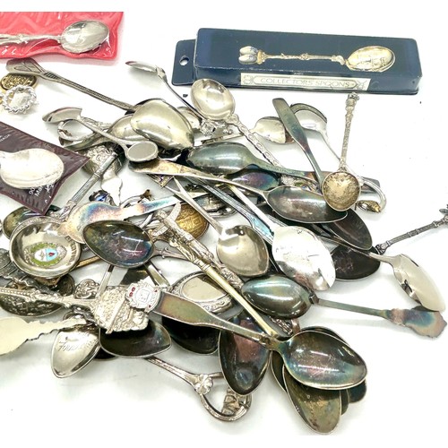 514 - Assortment of silver plated souvenir spoons