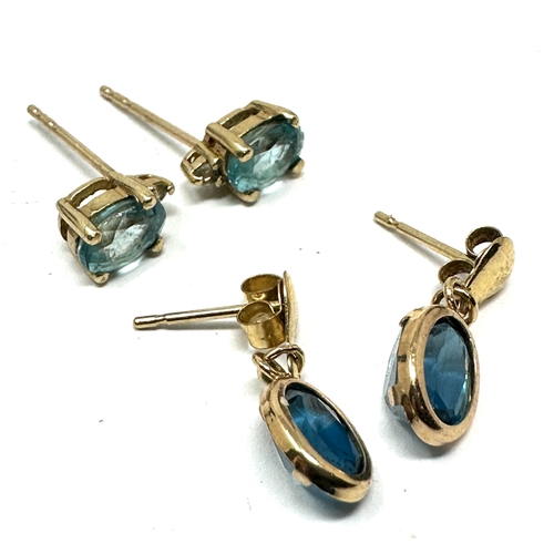 179 - 2 9ct gold blue gemstone earrings weight 2g  
 one pair missing backs