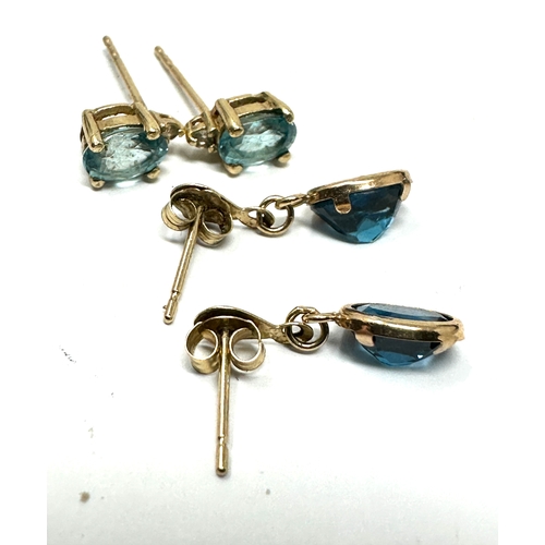 179 - 2 9ct gold blue gemstone earrings weight 2g  
 one pair missing backs