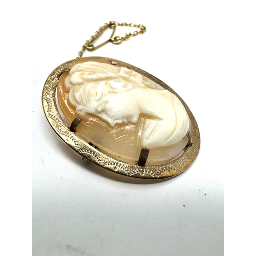 182 - 9ct gold cameo brooch measures approx 3cm by 2.4cm weight 4.5g