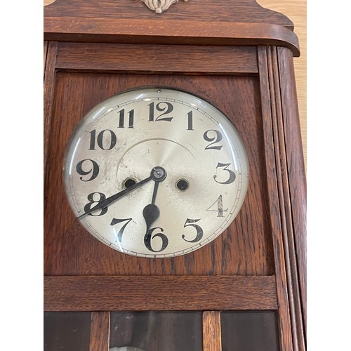 25 - Two key hole wall clock in working order