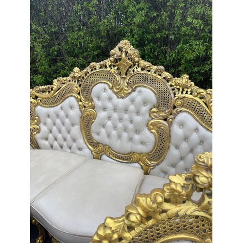 439 - Gilt framed Italian style leather three piece suite. resin frame, approximate measurements of 3 seat... 