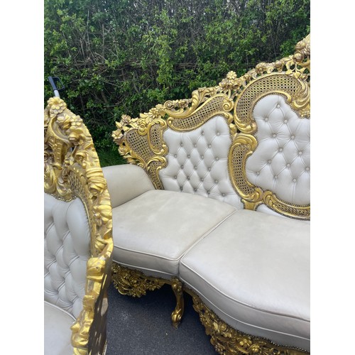 439 - Gilt framed Italian style leather three piece suite. resin frame, approximate measurements of 3 seat... 