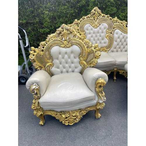 439 - Gilt framed Italian style leather three piece suite. resin frame, approximate measurements of 3 seat... 