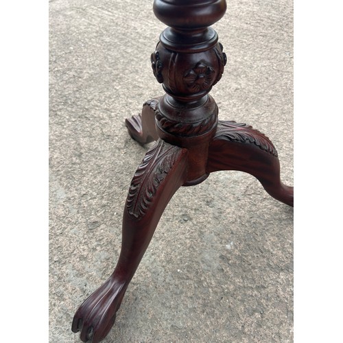 418 - Mahogany occasional table with bird cage detail underneath measures approx 28 inches tall by 23.5 di... 