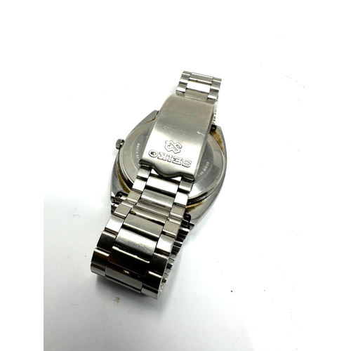 438 - Gents quartz Seiko day date sq 7546-6010 the watch was ticking but has stopped possibly needs replac... 