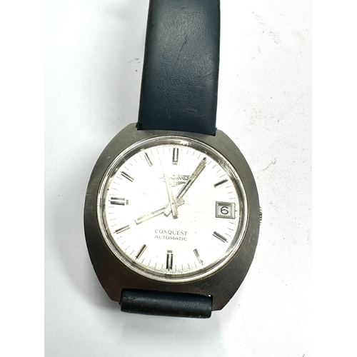 439 - Vintage gents Longines conquest automatic wristwatch the watch is ticking when shaken but stops